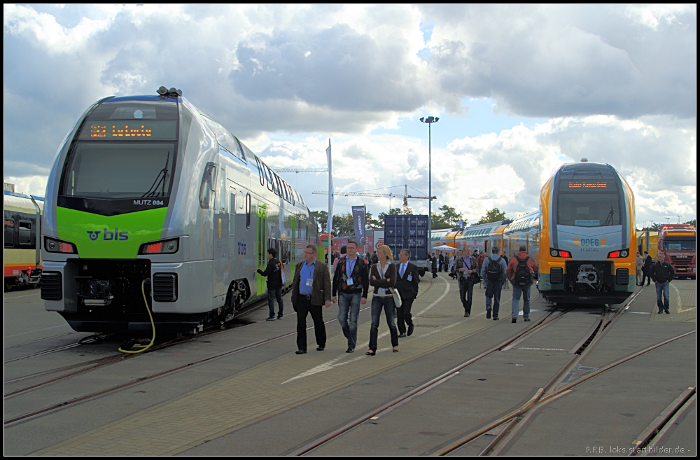 Die von Stadler an bls und ODEG ausgelieferten Versionen des Doppelstocktriebzug KISS auf der InnoTrans 2012 in Berlin