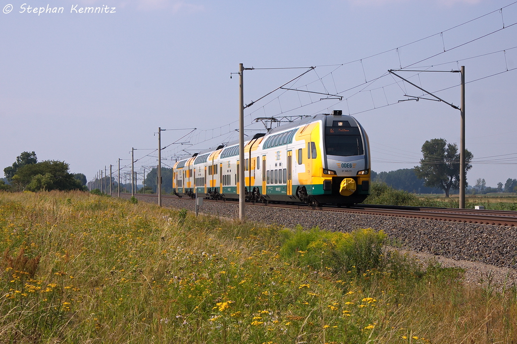 ET 445.111 (445 111-8) ODEG - Ostdeutsche Eisenbahn GmbH als RE2 (RE 37374) von Wismar nach Paulinenaue in Vietznitz. Aufgrund von Unwettersch�den am 06.08.2013, wurde die Bahnstrecke zwischen Berlin und Hamburg unterbrochen. Der Gleisabschnitt Paulinenaue–Nauen war bis zum Betriebsschluss unterbrochen gewesen. Eine Windhose hatte B�ume entwurzelt und diese hatten die Oberleitung besch�digt. Im Gleisabschnitt Paulinenaue–Wismar wurde im 2h-Takt gefahren. 06.08.2013