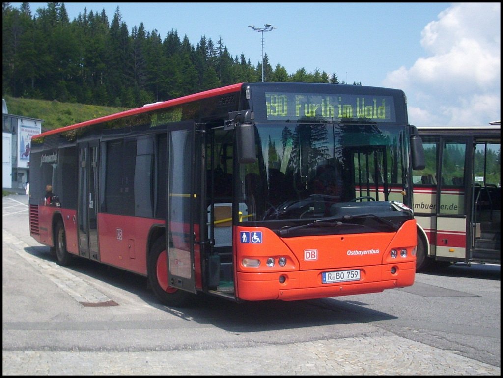 Neoplan Centroliner von Ostbayernbus vor dem gro�en Arber.

