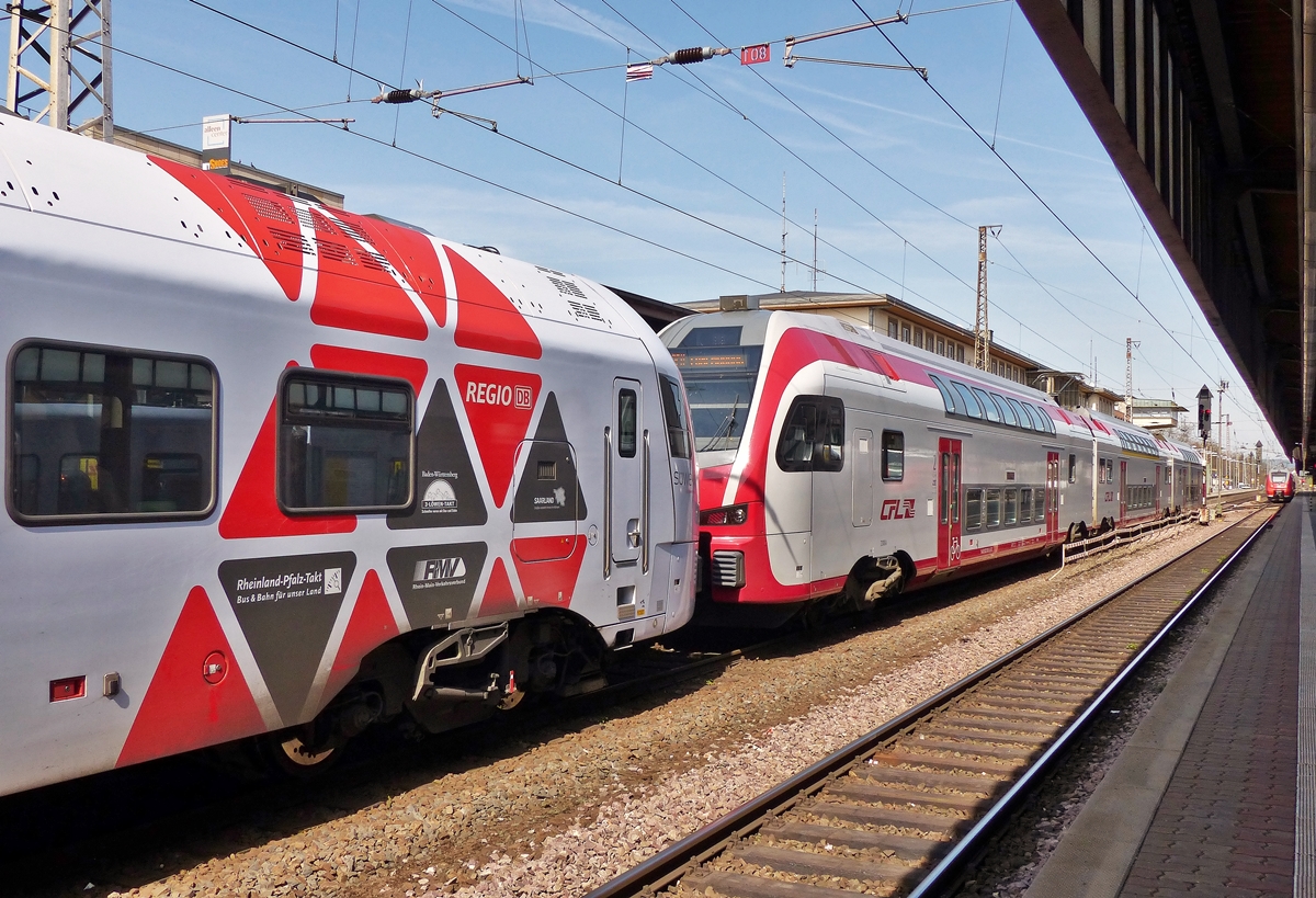 . Der 5-teilige FLIRT der DB Regio und der KISS 2306 der CFL fahren zusammen gekoppelt am 10.04.2015 in den Trierer Hauptbahnhof ein. Sie kommen aus Koblenz und werden in Trier getrennt. Der SWEX fhrt weiter nach Mannheim, whrend der KISS nach Luxembourg fhrt. (Jeanny)