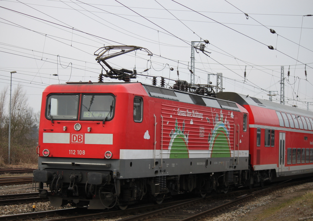 112 108-6 mit RE 1(RE 4309)von Hamburg Hbf nach Rostock Hbf bei der Einfahrt um 12:54 Uhr im Rostocker Hbf.27.02.2015