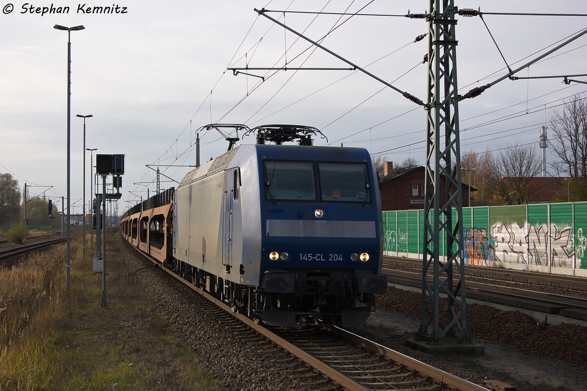 145-CL 204 (145 100-4) Alpha Trains f�r Crossrail AG mit einem leeren Autotransportzug in Rathenow und fuhr zum Wustermarker Gbf weiter. 14.11.2013