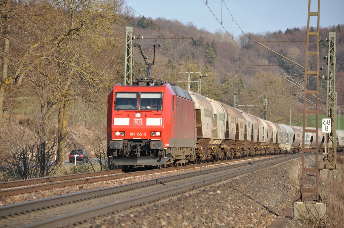 185 155-9 mit einem Getriedezug bei Amstetten am 20.03.2012.