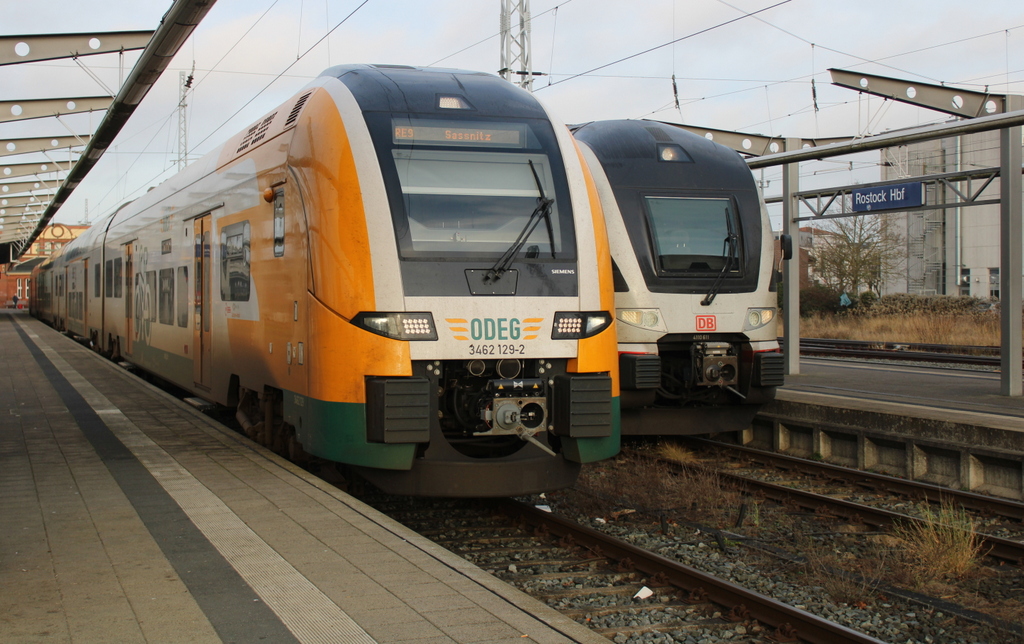 3462 129-2 und 4110 611 standen gemeinsam am 14.12.2025 im Rostocker Hbf.