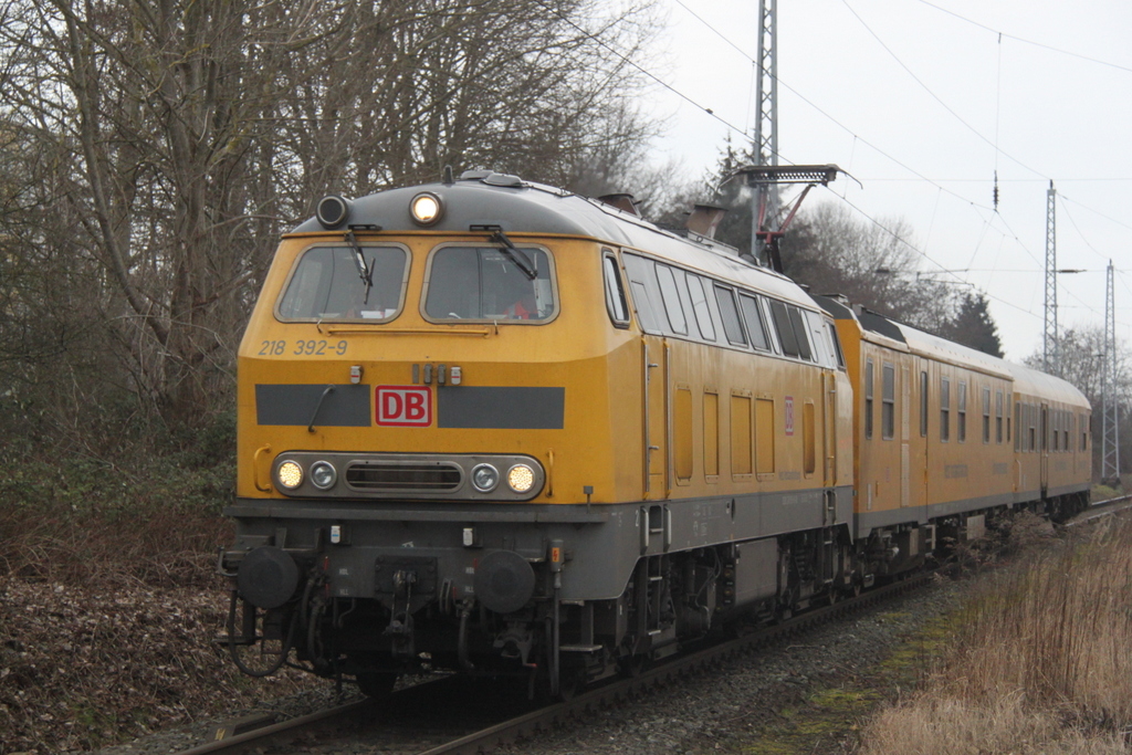 DB Netzinstandhaltung 218 392-9 mit Messzug zur Fahrwegmessung von Warnem�nde Werft Richtung Rostock Hbf bei der Durchfahrt im Bahnhof Rostock-Bramow.06.02.2016