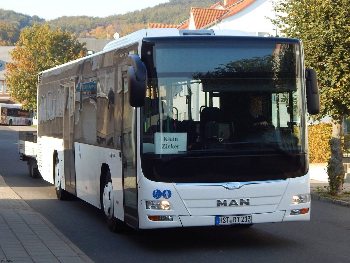 MAN Lion's City LE Ü vom Reiseienst Teske aus Deutschland mit Anhänger in Sassnitz.