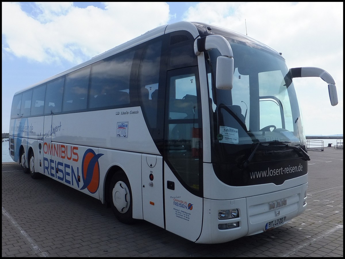MAN Lion's Coach von Losert-Reisen aus Deutschland im Stadthafen Sassnitz. 