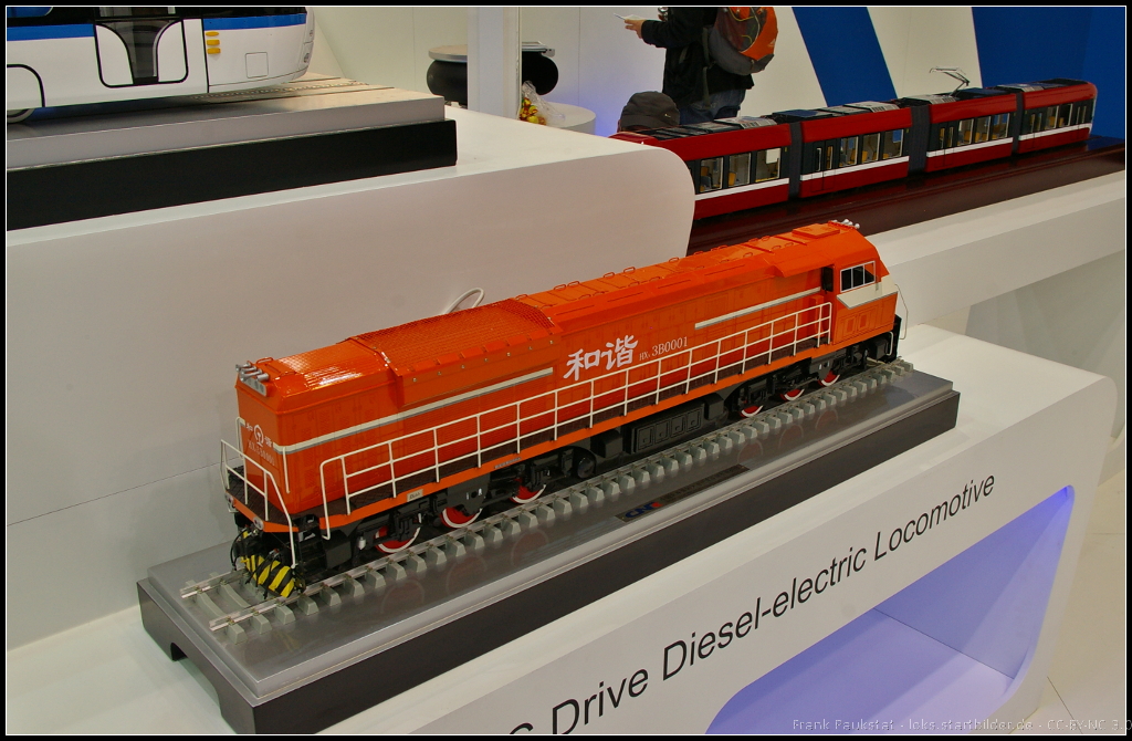 Model of HXN3B 001 at InnoTrans 2014 in Berlin

Bei der Lok handelt es sich um eine Diesel-elektrische Rangier- und Streckenlokomotive des Herstellers Dalian Locomotive & Rolling Stock Co. aus China. Ausgestellt war das Modell auf dem Hallenstand der CNR während der InnoTrans 2014 in Berlin

Website (englisch, Data): http://www.dloco.com/LISTS/product/_MAINPAGE/EProducts/default3.aspx?id=1113
