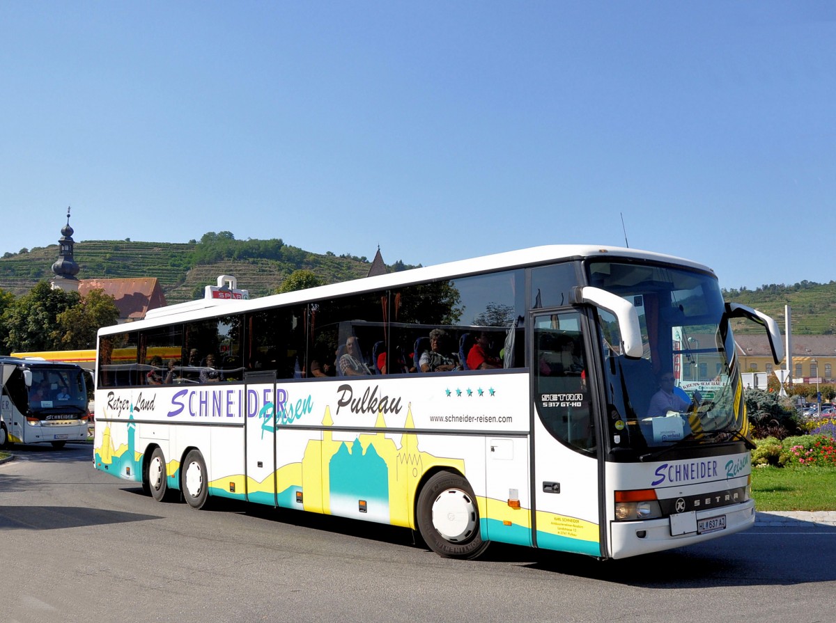 SETRA 317 GT-HD von SCHNEIDER Reisen aus Pulkau/Nieder�sterreich im September 2013 in Krems unterwegs.