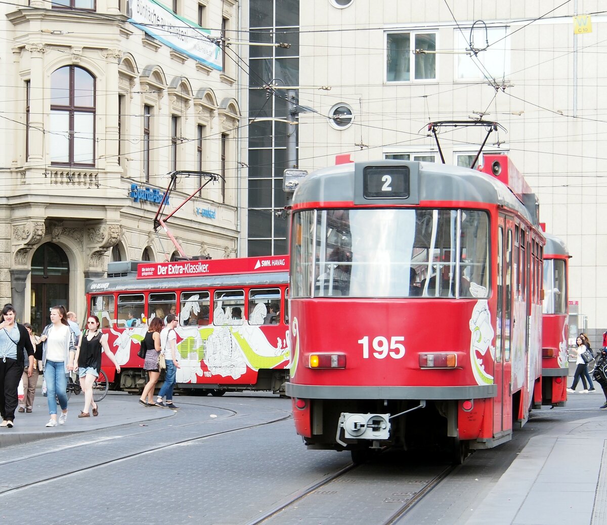 Stadtverkehr Halle (Hallesche Verkehr AG - HAVAG), Tatra Stra�enbahn T 4 DC Nr.1160 und 1190 mit H�nger B 4 DC Nr.195 von CKD-MGB Baujahre 1982/83 am Marktplatz in Halle am 29.06.2015.