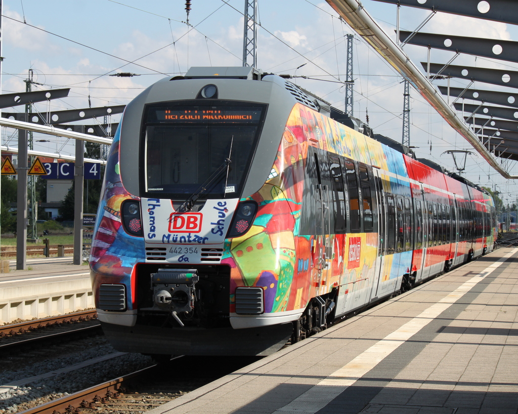 Werbehamster 442 354 stand am 08.08.2014 im Rostocker Hbf.