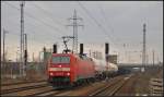 DB Schenker 152 145 mit einem gemischtem G�terzug am 03.04.2013 in Berlin Sch�nefeld Flughafen