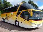 Neoplan Starliner von Postauto aus der Schweiz im Stadthafen Sassnitz.