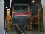 Dank ge�ffneter Tore im Triebwagenschuppen konnte ich den aufgebockten 628 314 im Bh Rostock,am 17.Dezember 2011,fotografieren.