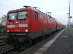 Kieler Renntrabbi alias 112 143-3 steht mit Ihrer S1 von Rostock Hbf Richtung Warnemnde im Bahnhof Rostock-Bramow.(10.11.10)