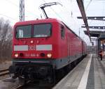 143 806-8+114 018-5 als berfhrung von Rostock Richtung Berlin kurz vor der Ausfahrt im Rostocker Hbf(16.02.2011)