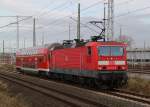 143 841-5 mit Pbz von Rostock Hbf nach Berlin/Cottbus bei der Ausfahrt im Rostocker Hbf.30.11.2011 