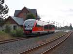 Der Rostocker 642 549-0 verließ nach der Kreuzung mit dem Gegenzug,als RE 13118 Tessin-Wismar den Bahnhof Sanitz am 03.August 2014.