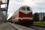 119 158 mit DPF 87044 Bad Doberan - Berlin-Schöneweide  bei der Ausfahrt im Rostocker Hbf.10.08.2024