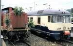 427 404 und 212 244 in Göppingen am 21.06.1986.