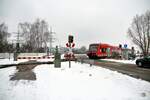 650 322 und 323 beim Bahnübergang zwischen Bellenberg und Vöhringen am 14.02.2011.