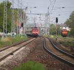 114 040-9 mit Sonderzug 13290 von Warnemnde nach Berlin-Zoo bei der Ausfahrt im Haltepunkt Rostock-Bramow neben an war 346 811-3(Werklok 3)der Firma Rostocker Fracht und Fischereihafen am