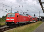 146 214-2 mit RE1(Rostock-Bad Kleinen)bei der Ausfahrt im Rostocker Hbf.24.08.2025