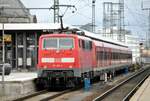 111 210-1 mit x-Wagen S-Bahn in Nürnberg und Bxf 796 Steuerwagen am 04.04.2011.
