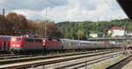 115 278-4 mit einem langen Schadzugin Ulm am 20.09.2014.