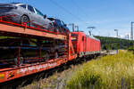 Die 185 388-6 (91 80 6185 388-6 D-DB) der DB Cargo AG fährt am 28 Juni 2024 mit einem beladenen Autotransportzug (Wagen der Gattung Laaeffrs 560.1) Gattung Laaers 560.1 der DB Cargo Logistics GmbH (ex DB Schenker ATG), durch Rudersdorf (Kreis Siegen) in Richtung Gießen bzw. Frankfurt (südlicher Richtung).

Die TRAXX F 140 AC2 wurde 2009 von der Bombardier Transportation GmbH in Kassel unter der Fabriknummer 34695 gebaut.