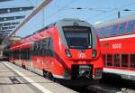 442 356-2 steht als RB 12(RB 13265)von Rostock Hbf nach Ribnitz-Damgarten West im Rostocker Hbf bereit.Auf dem Nachbargleis stand RE 4363 Richtung  Lutherstadt Wittenberg.30.05.2014