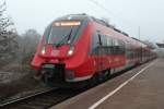 442 350 als S2 von Gstrow nach Warnemnde Werft kurz nach der Ankunft im Haltepunkt Rostock-Holbeinplatz.27.11.2015