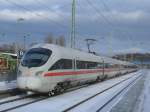 Als ICE 1515 von Binz nach M�nchen fuhr,am 08.Dezember 2012,der 411 002-9 der hier im verschneiten Bergen/R�gen hielt.