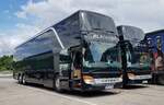 Setra S 431 DT-Busse vom Tourneeservice BLACKFIRE stehen zur Fahrerpause auf einem Rastplatz an der A 7