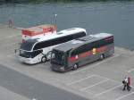 Neoplan Cityliner von Rose Reisen aus Deutschland und Mercedes Travego von Herol aus Deutschland im Stadthafen Sassnitz