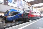 ET 301 Meridian 1430 001 Transdev und �BB 1116 229 Railjet in M�nchen Hbf am 09.11.2014.