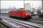 Solo ist am 30.01.2011 DB Schenker 185 070-0 auf H�he des S-Bahnhofs Berlin Greifswalder Str unterwegs.