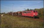 Die verkehrsrote DB Schenker 151 086-6 mit Sch�ttgut unterwegs in Richtung Eichgestell (gesehen Berlin Wuhlheide 13.10.2010)
