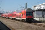 Warnemnde-Express 18590 von Berlin Hbf(tief)nach Warnemnde bei der Durchfahrt am 06.04.2015 in Warnemnde Werft.