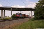 421 393-0 SBB Cargo f�r MTEG - Muldental Eisenbahnverkehrsgesellschaft mbH mit einem Containerzug bei Nennhausen und fuhr in Richtung Rathenow weiter.