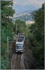 Diese Aufnahme entstand bei Trontano und zeigt den SSIF ABe 4/6 63 als Schnellzug D32 von Locarno nach Domodossola, weit unten, von der Sonne beschienen ist Rancaldina zu erkennen.