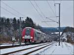 Zwei gekuppelte Triebz�ge der S�rie 2200 (2217 und 2220) fahren am 18.01.2013 als IR 3764 Luxembourg - Troisvierges in den Bahnhof von Wilwerwiltz ein.