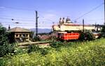 ÖBB 1044 mit D-Zug bei Stift Melk am 06.08.1986.
