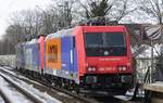 Nachschuss auf das aus Basel kommende Loktrio 421 371-6/484 013/482 039-5, das am 14.02.2021 durch Neuss S�d in Richtung Krefeld f�hrt