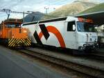 RhB Ge 3/3 Nr.214 und Ge 4/4 III Nr.649  Holcim  in Samedan am 01.09.2005.