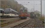 La DER de la Saison / Das Saison Ende der Blonay Chamby Bahn 2025 - Seit einigen Jahren zeigt die Blonay Chamby Bahn zum Saison Ende mit einem verdichteten Fahrplan noch einmal ihre herrlichen Fahrzeuge im Einsatz: Viel Verkehr in Chamby auf Gleis 3 warte der CGTE Fe 4/4 151 auf Anschlussreisende der MOB und auf den beiden MOB Gleisen kreuzen sich zwei MOB PE30 Regionalzüge Zweisimmen - Montreux, resp Montreux - Zweisimmen. 

25. Okt. 2025