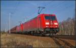 DB Schenker 185 384 und 185 264 mit Falns-Wagen am 07.03.2014 durch die Berliner Wuhlheide